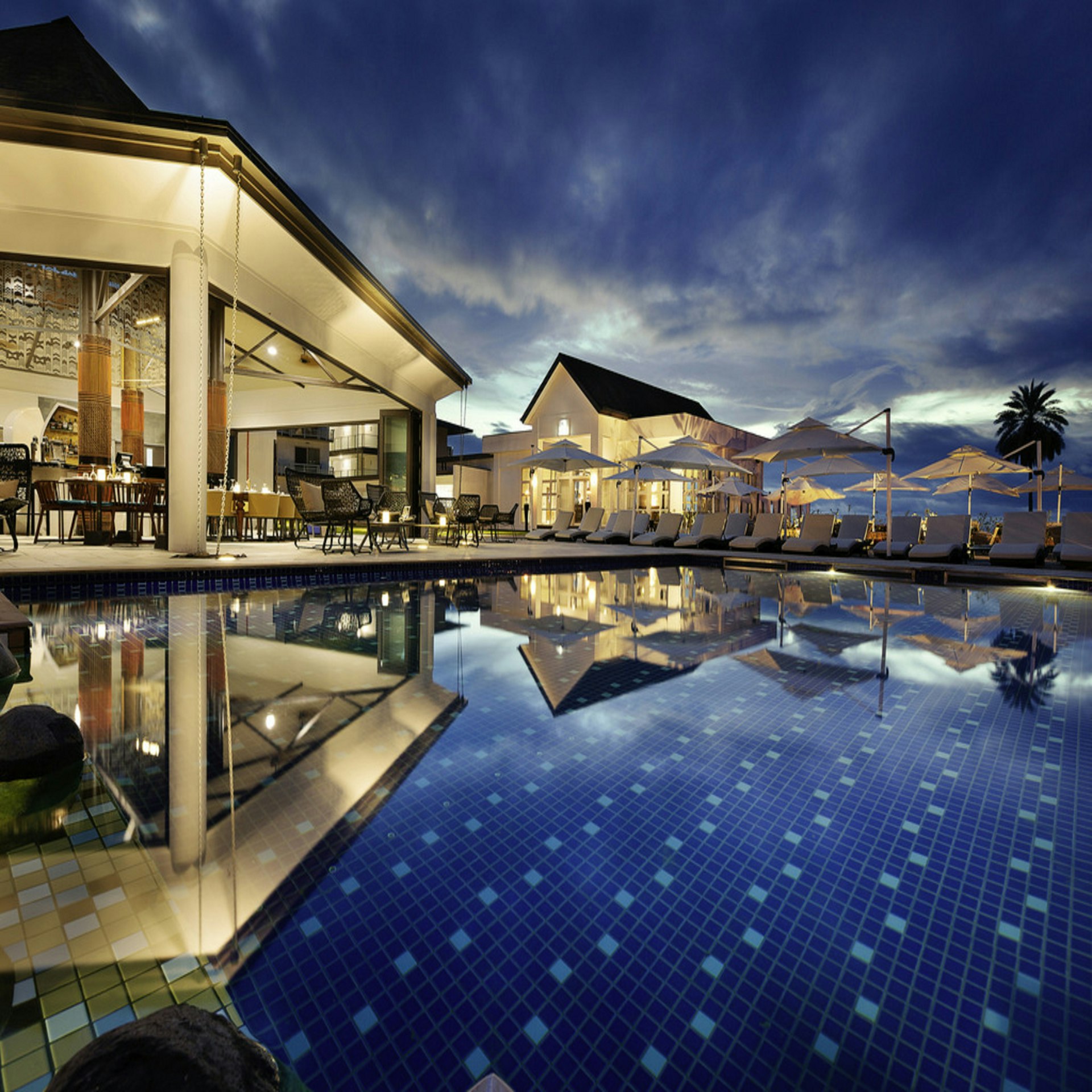 A peaceful resort framed by palm trees